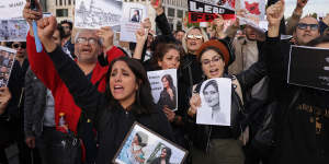 Protesters gather in Berlin,Germany,to demonstrate against the death of Mahsa Amini in Iran.
