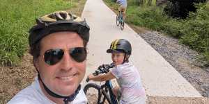 Byron councillor Asren Pugh rides the Tweed rail trail with his family.
