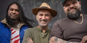 Indigenous rappers Baker Boy (left) and Briggs (right) with singer-songwriter Paul Kelly (centre).