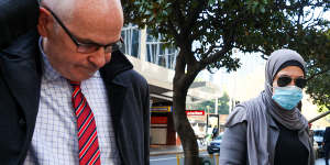 Mariam Hamade leaves Downing Centre District Court with her lawyer Michael Blair (left).