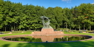 A monument to Chopin in the Lazienki Park at autumn,Warsaw,Poland.