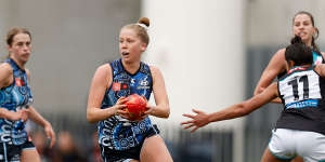 Paige Trudgeon on the run for the Blues.