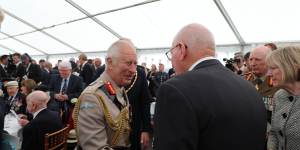 The King shakes hands with Governor-General David Hurley.