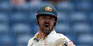 Australia’s Travis Head reacts after being caught.