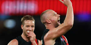 Jake Stringer points to the sky,a nod to the support he has found in the Muslim community.