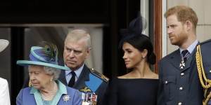 The Queen “avoided confrontation”,especially those involving Prince Andrew (behind her) and Prince Harry and his wife Meghan.