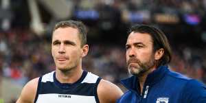Geelong captain Joel Selwood and coach Chris Scott line up for the national anthem just prior to last year’s preliminary final against Melbourne.