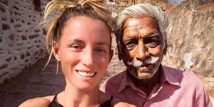 Jolie King snapping a selfie with a man in the city of Jodhpur,India. 