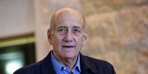 Former Israeli prime minister Ehud Olmert speaks to the media after the Supreme Court reduced his prison sentence from six years to 18 months in the Holyland corruption case.