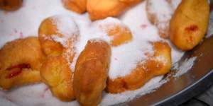 Doughnuts in sugar at American Doughnut Kitchen.