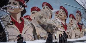 A mural in Moscow shows members of Yunarmiya,or Youth Army,an organisation associated with the Russian Defence Ministry.