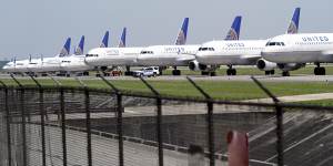 Grounded United Airlines planes parked at an airport in Texas. The industry expects it will take years to recover from the pandemic.