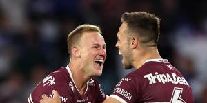 Daly Cherry-Evans and Luke Brooks celebrate their win over Canterbury.