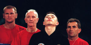 Johnny Lewis,second from left,with Kostya Tszyu before a contest.