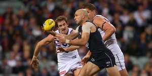 Former Carlton and West Coast champion Chris Judd in full flight against the Dockers.