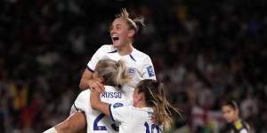 England’s Alessia Russo,center,is celebrated after she scored her side’s second goal.