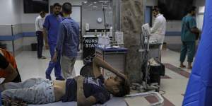 A wounded Palestinian boy in the emergency room of Al Shifa Hospital,following Israeli airstrikes on Gaza City on October 17. Israeli ground forces have since advanced on and searched the hospital.