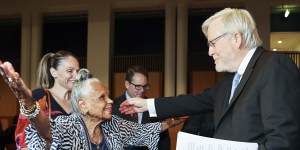 Arabana elder Aunty Martha Watts embraces former prime minister Kevin Rudd on the 15th anniversary of the National Apology to the Stolen Generations. 