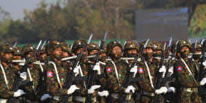 Soldiers march during the Union Day ceremony on Saturday.