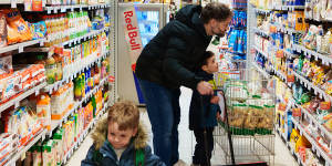 Stefano Baldo shopping with his sons Ruben and Gioele in Bolzano,Italy.