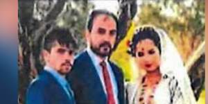Mohammad Ali Halimi,middle,and Ruqia Haidari,right,on their wedding day.
