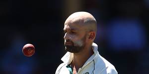 Shane Warne has turned the heat up on Nathan Lyon,saying the off-spinner’s Test berth is up for grabs if he does not lift in the Ashes.