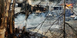Smokes and flames billow from vehicles in Hpruso township,Kayah state,in Myanmar.