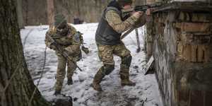 Recruits practise combat skills near Kyiv last month.