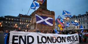 Independence supporters gather in George Square after the announcement that Scotland's First Minister Nicola Sturgeon will ask for permission to hold a second independence referendum. 