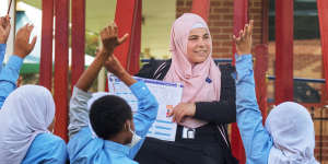 Majida Ali,school curriculum co-ordinator,with students at East Preston Islamic College.