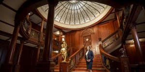 Jessica Sanders,chief executive of the RMS Titanic,with the replica of the Grand Staircase at the Titanic which is on display at the Melbourne Museum from Monday. 