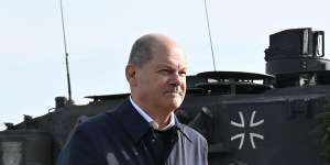 German Chancellor Olaf Scholz with a Leopard 2 tank 