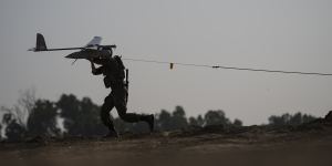 An Israeli soldier prepares to launch a drone near the Israeli-Gaza border,southern Israel in January.
