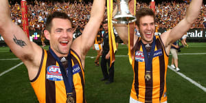 Four-time Hawks premiership teammates Luke Hodge and Grant Birchall both finished their careers with the Lions.