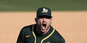 Aussie gets win for A's in comeback victory over Astros