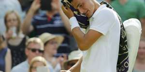 Angry young man ... Bernard Tomic unleashed a barrage of criticism against Tennis Australia and Pat Rafter in a press conference after his third-round loss to Novak Djokovic.