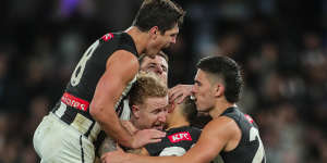 Collingwood came back from 54 points down to beat North Melbourne with Bobby Hill the matchwinner.