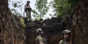 Ukrainian soldiers in trenches in eastern Ukraine ahead of the launch of the counteroffensive.