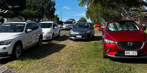 Cars parked on the verge at Norman Park. In Brisbane,motorists can be fined $116 for the offence “stop on footpath,shared path,dividing strip or nature strip”.