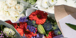 A flower tribute outside St Andrew’s Cathedral School in memory of Lilie James on Monday.