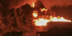 Oil tanks burn at the port in Hodeidah,Yemen on Sunday.