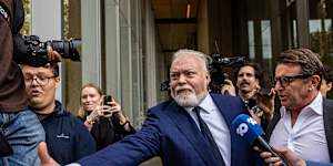 Broadcaster Kyle Sandilands departs the Federal Court on Friday afternoon.