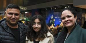 Amarjeet Sharma,right,of Mount Waverley,in Bourke Street Mall with husband,Vishal Sharma,and daughter Kheyaira. 