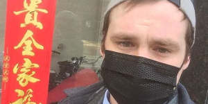 Connor Reed,25,in Wuhan,China. Having recovered from one of the earliest suspected cases of the coronavirus COVID-19,he is hoping to return to Brisbane,Australia.