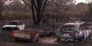 Burnt-out cars after bushfires hit southern Queensland.