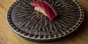 Akami zuke (marinated ruby-red tuna) nigiri.