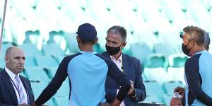 Nick Hockley and Sean Carrol talk to India team management at the SCG in January. 