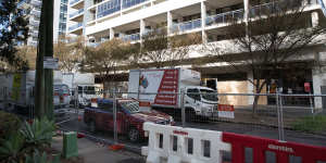 Moving vans outside Mascot Towers on Tuesday.