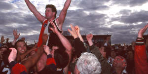 Danny Frawley chaired off after his last game in 1995.