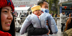 China’s population shrinks again as births fall to record low